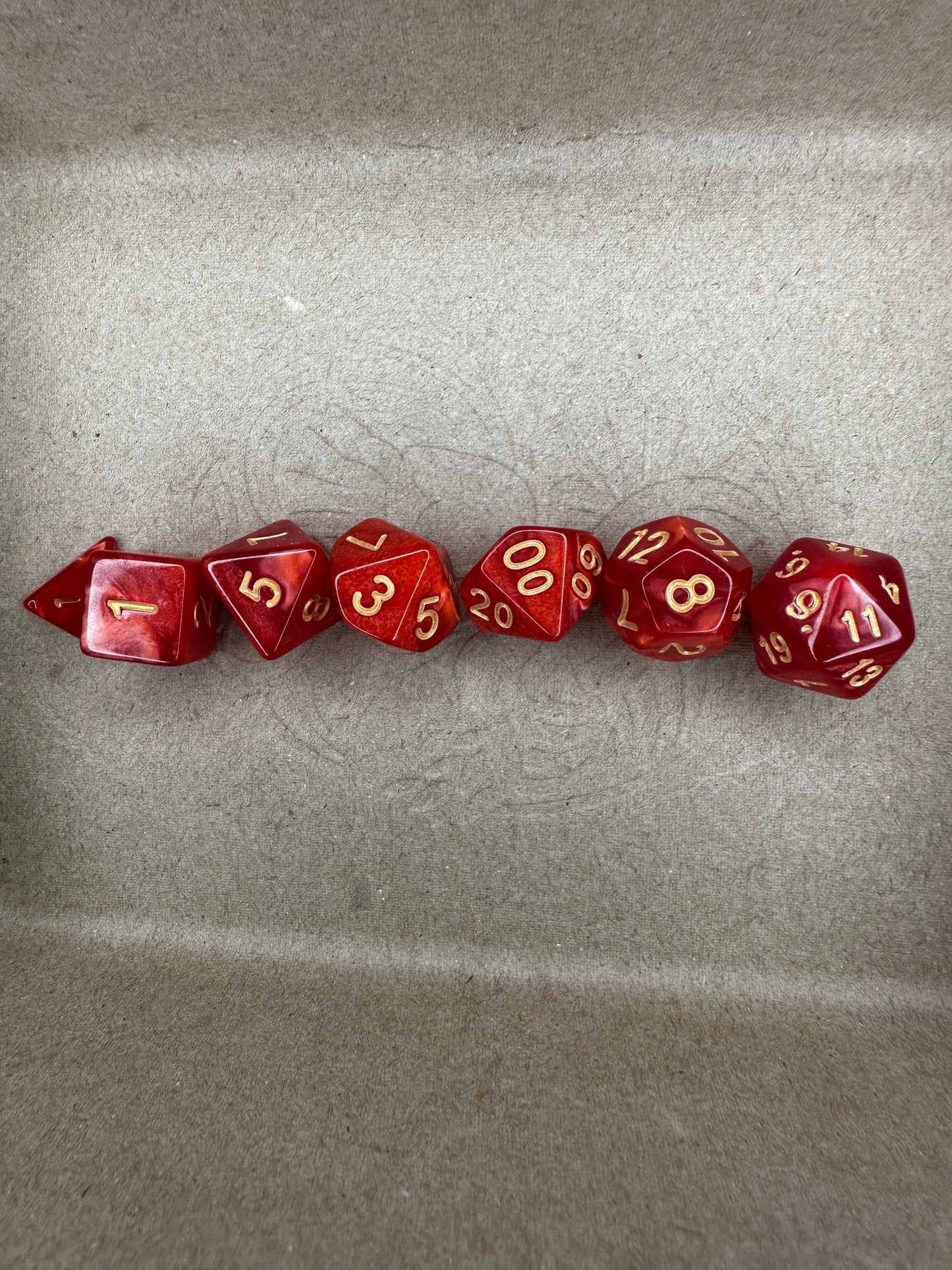 Red 7piece set of dnd ttrpg gaming dice