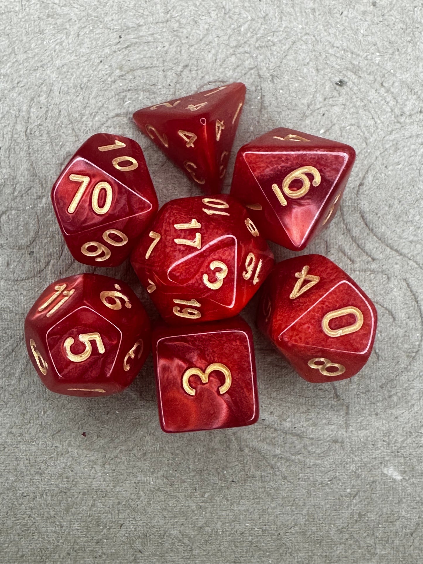 Red 7piece set of dnd ttrpg gaming dice