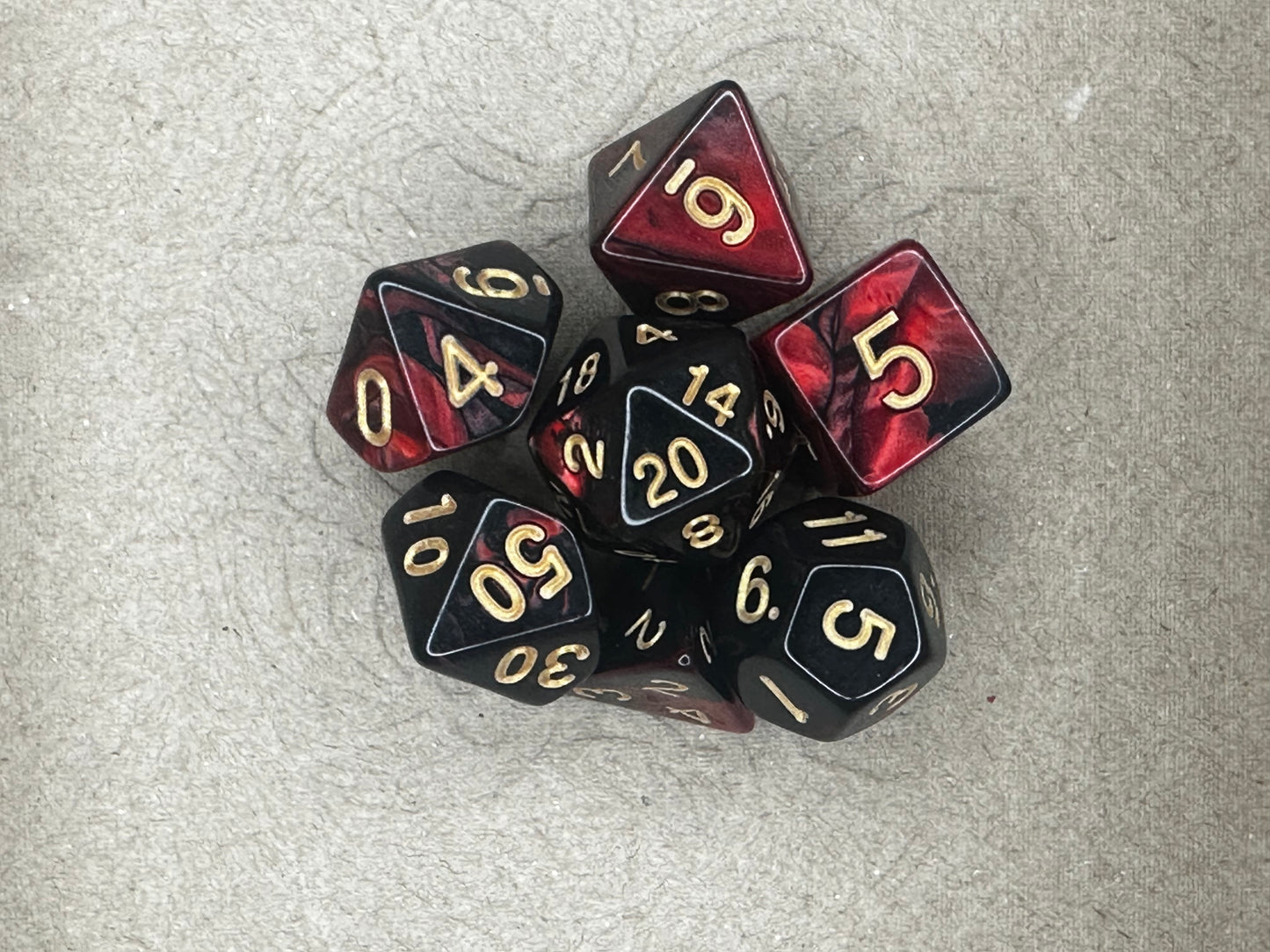 7 piece Red and Black dnd tabletop gaming dice set